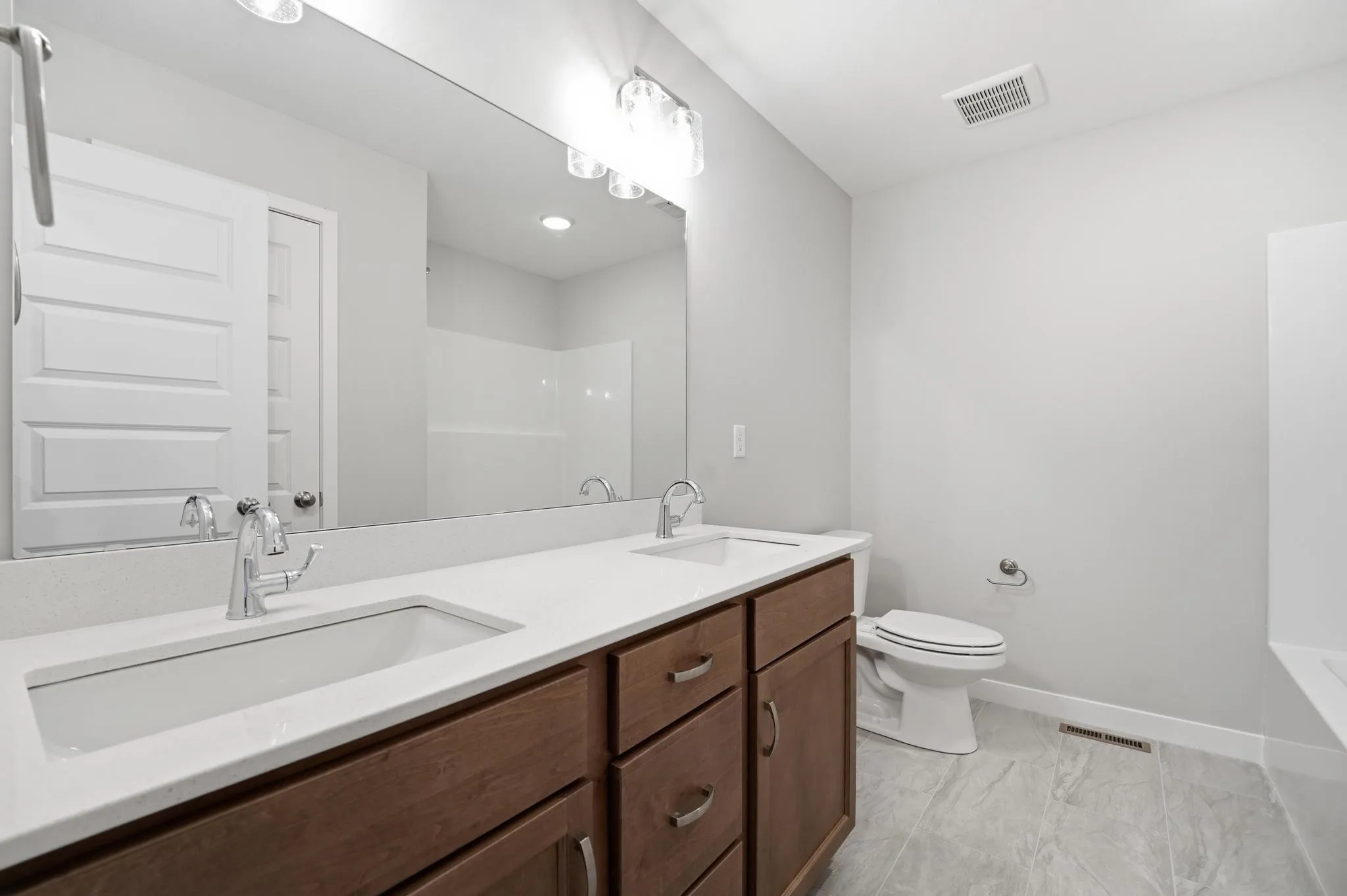 Second bathroom in the Gardenia Farmhouse floorplan 808 Glenn Cir Lot 144