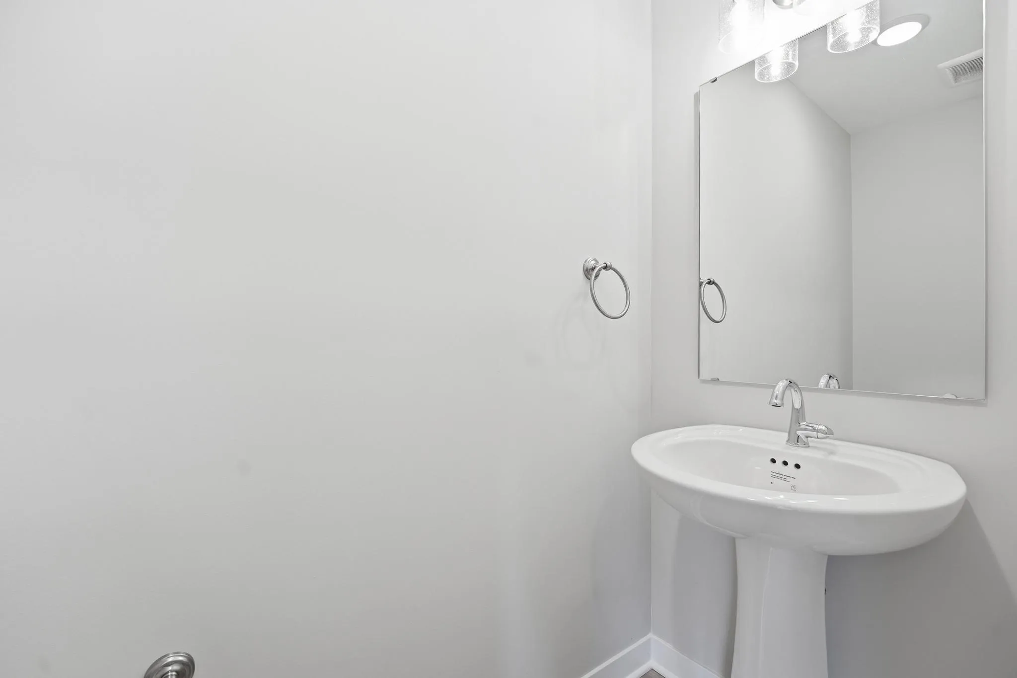 Lower level half bathroom featured in the Gardenia Farmhouse Floorplan 808 Glenn Cir. Lot 144