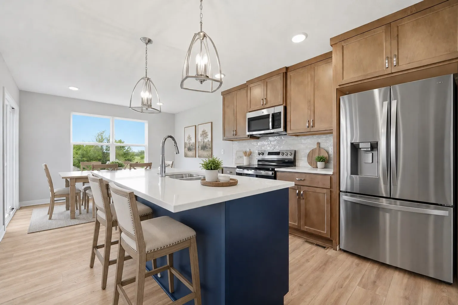 Ready to dine in the spacious kitchen featured in the Gardenia Farmhouse Floorplan 808 Glenn Cir. Lot 144
