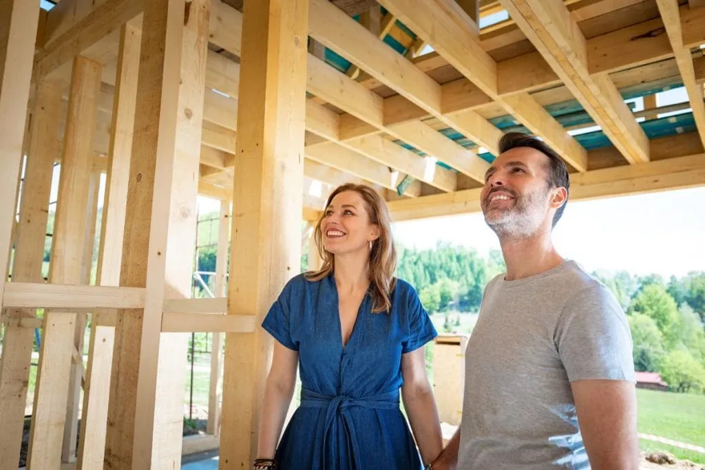 Homeowners touring their home under construction