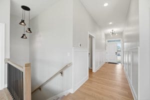 Lot 153ER 509 SW Newport Dr Avalon Contemorary Basement Stairs and hall way